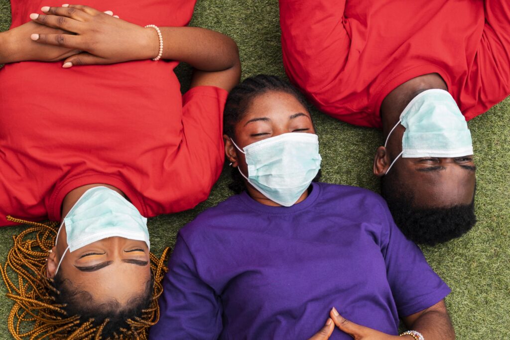 high angle friends with face mask concept scaled